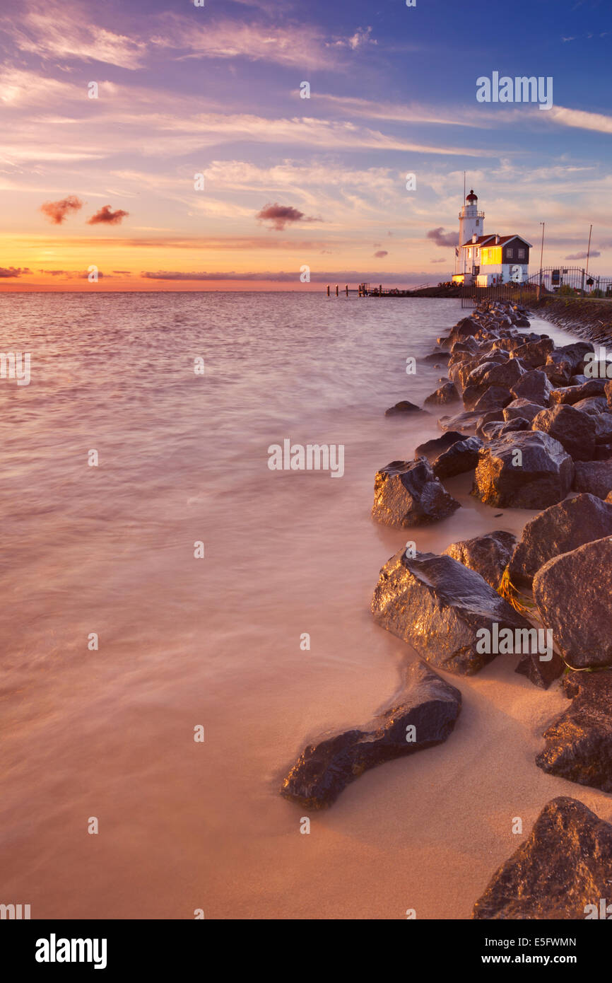 The lighthouse of the island of Marken, The Netherlands. Photographed at sunrise. Stock Photo