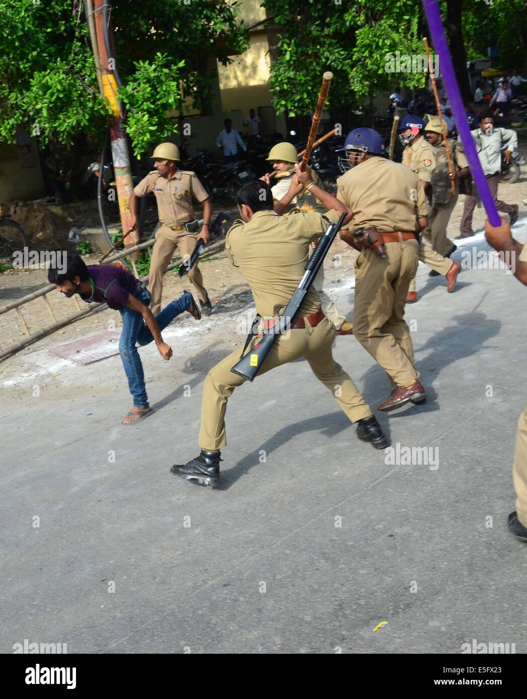 Allahabad, India. 30th July, 2014. Police lathi charge on ABVP students
