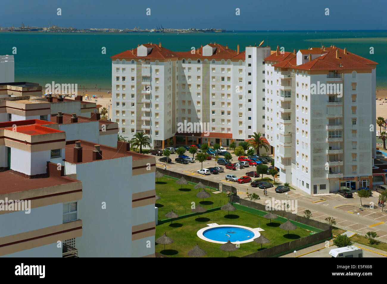 Blocks of flats near to sea, El Puerto de Santa Maria, (Cadiz city in the background), Cadiz-province, Andalusia, Spain, Europe Stock Photo