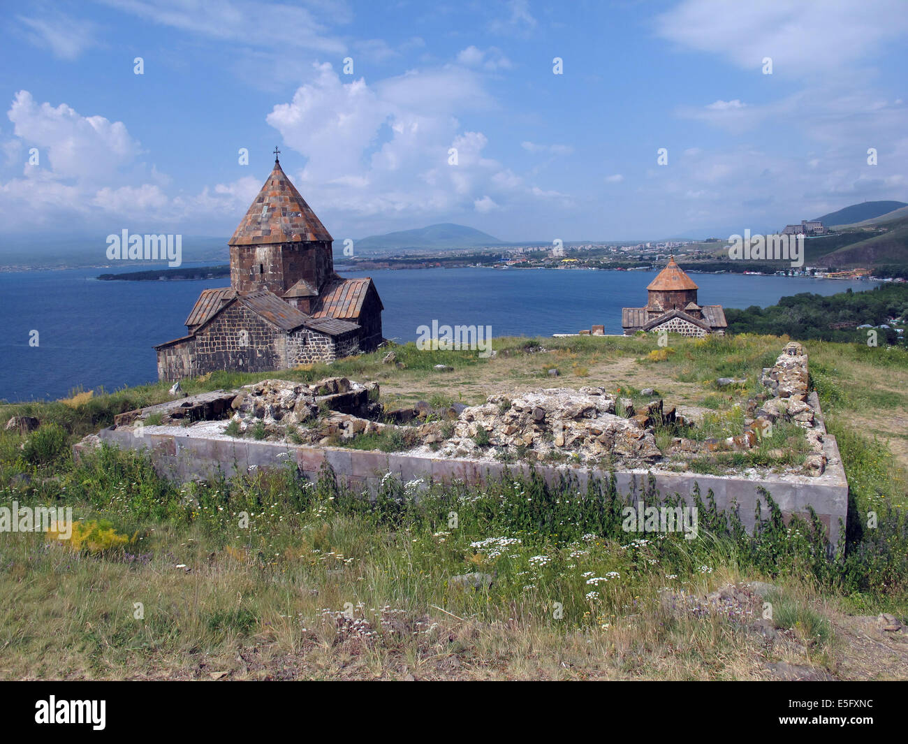 The Sewanawank monastery, founded in 874 at Lake Sewan, Armenia, 24 June 2014. The monastery used to be located on a small island in the lake. Due to a lower water level because of a use of the lake water for irrigation the island with the monastery now is a peninsula. Photo: Jens Kalaene Stock Photo