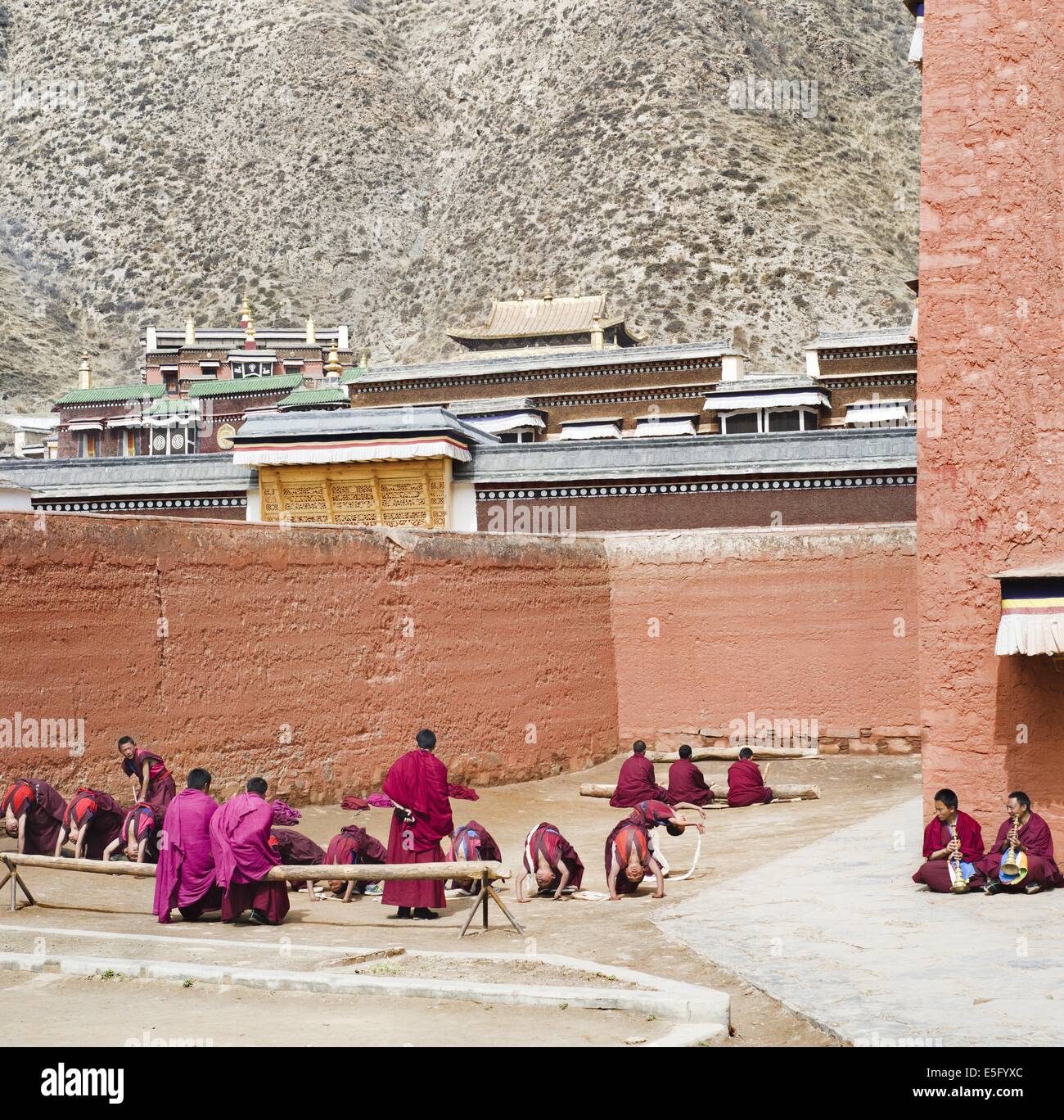 Tibetan Monks practising music in the Labrang Monastery, Gansu, China Stock Photo