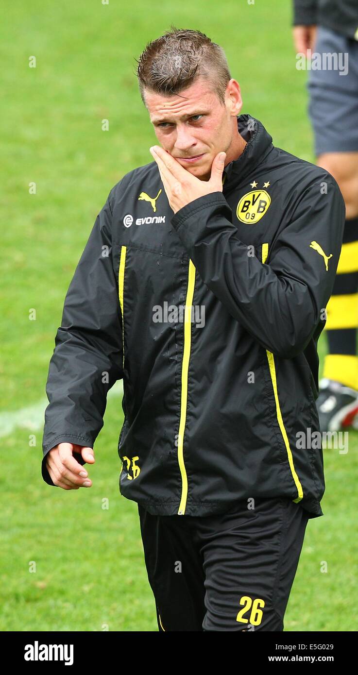 Bad Ragaz, Switzerland. 30th July, 2014. Lukasz Piszczek of Borussia Dortmund and his players during the training of Borussia Dortmund in Bad Ragaz, Switzerland, 30 July 2014. The Bundesliga team prepares in a training camp in Bad Ragaz for the next season until 06 August 2014. Photo: Karl-Josef Hildenbrand/dpa/Alamy Live News Stock Photo