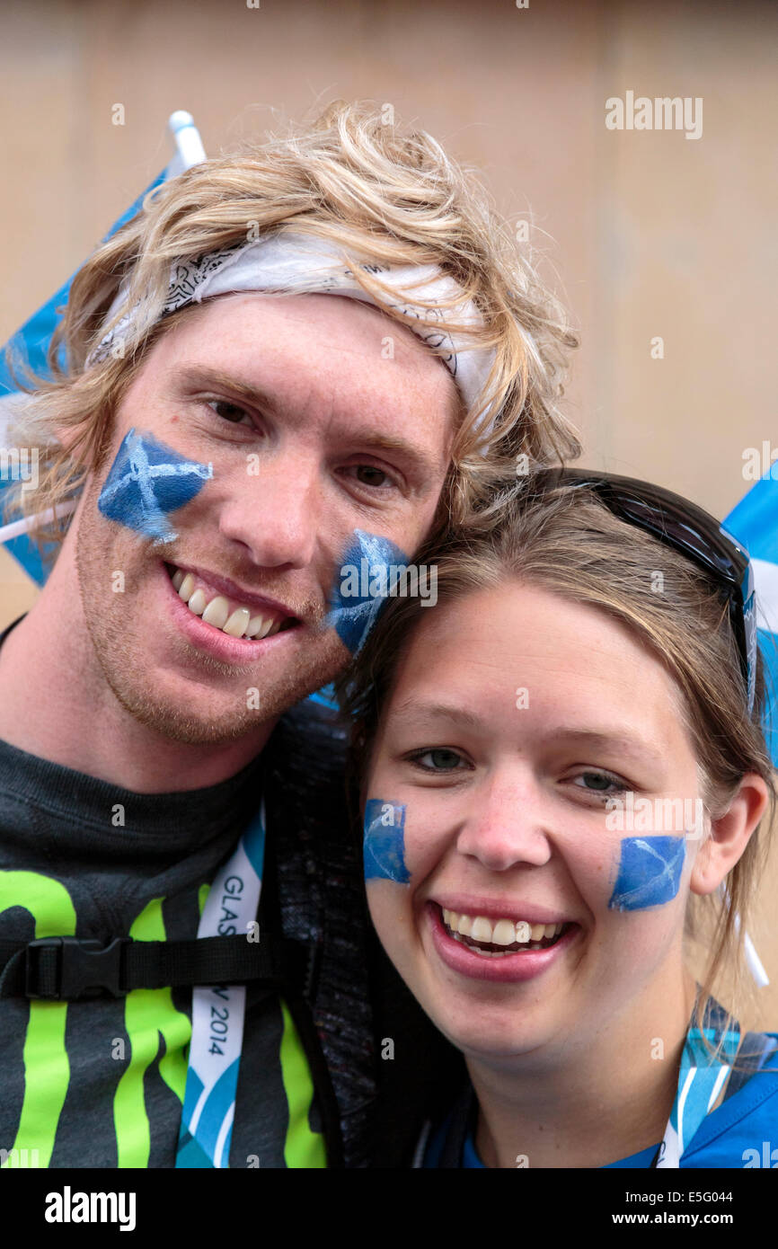 Craig Polson, aged 33, and Anna Carr-Gomm, aged 25 in Glasgow supporting Scotland Stock Photo