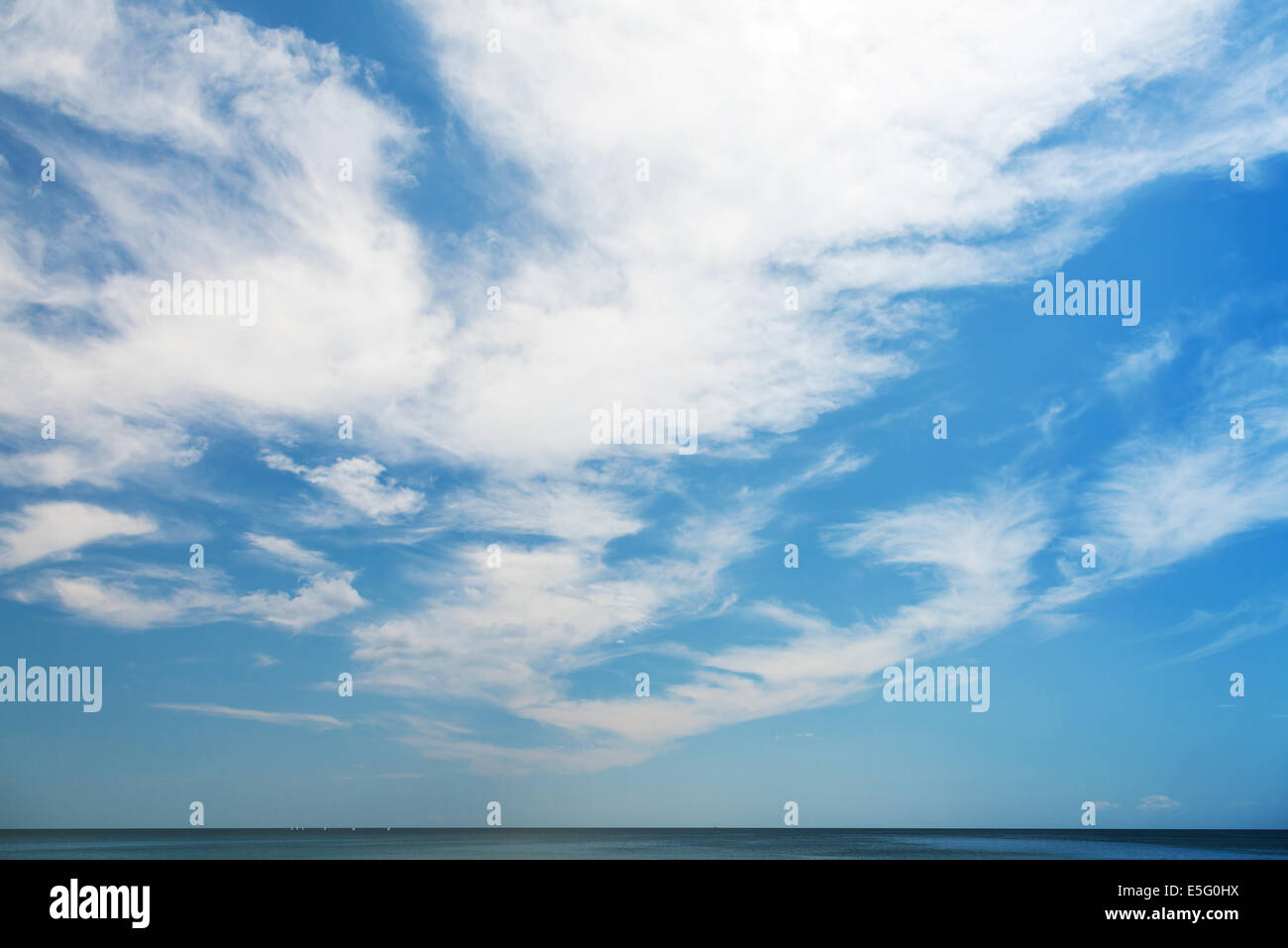 Natural blue cloudy sky background with horizon over sea water Stock ...