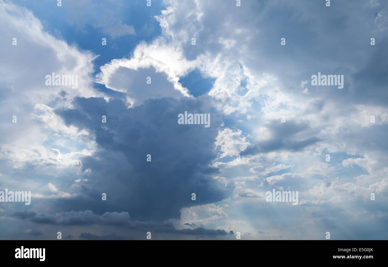 Dark stormy cloudy sky background photo texture Stock Photo
