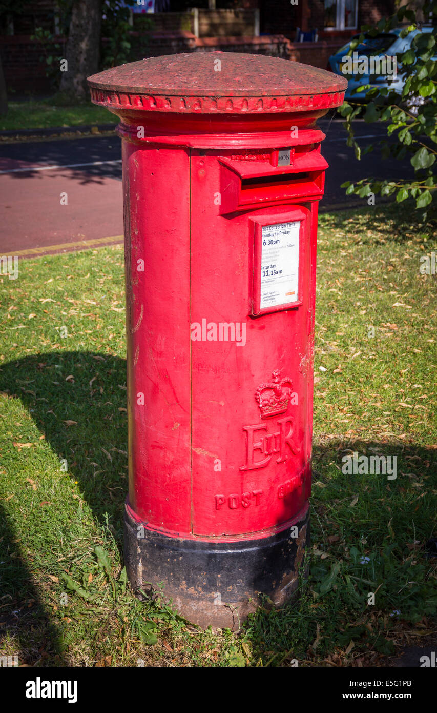 Royal Mail red post box in England Stock Photo