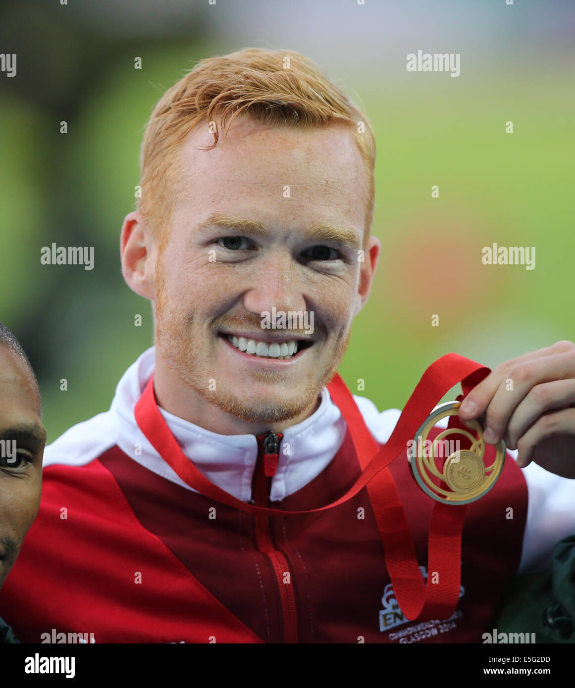 Greg Rutherford Podium GREG RUTHERFORD WINS GOLD LONG JUMP HAMPDEN PARK GLASGOW SCOTLAND 30 ...