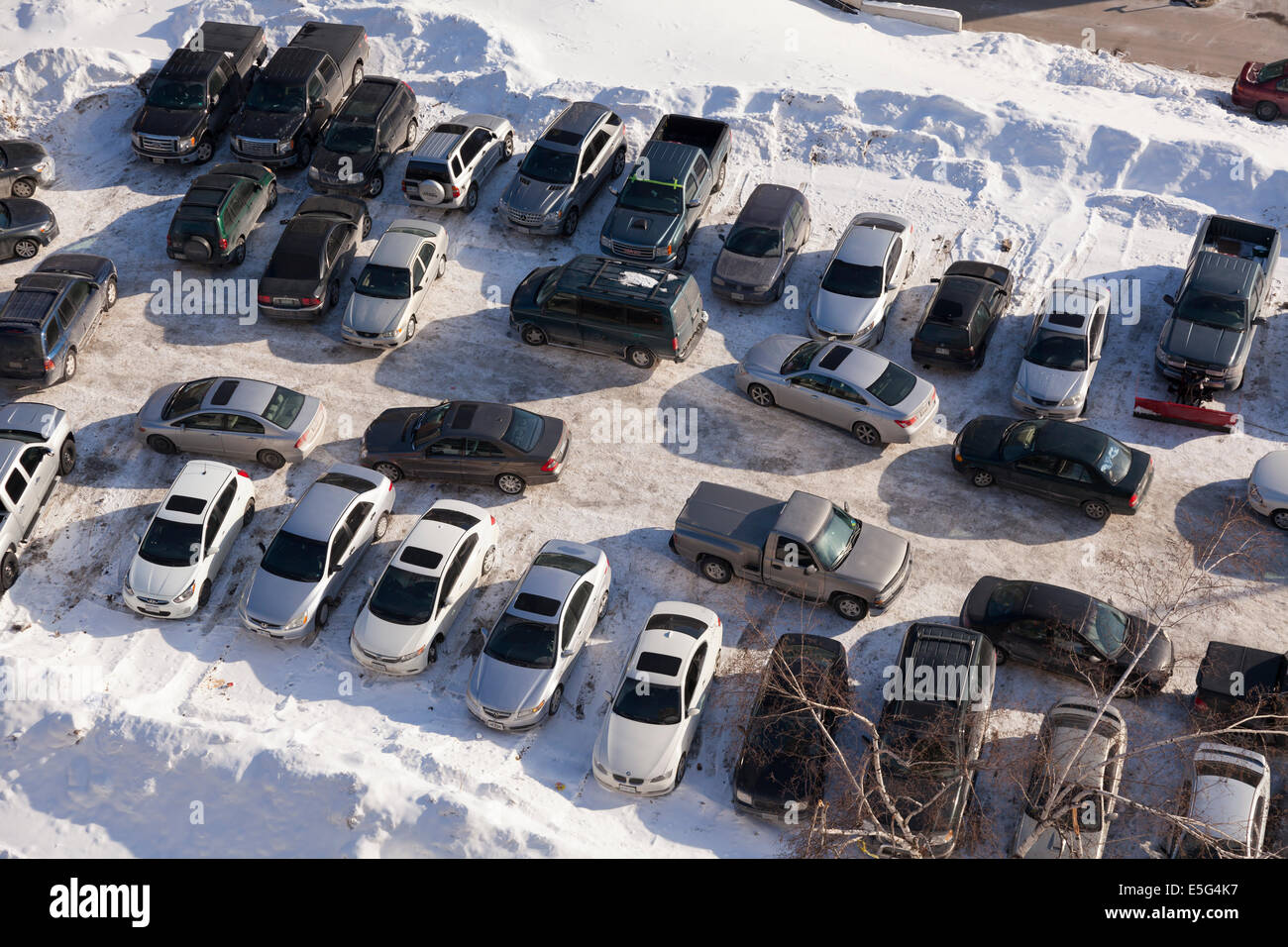 A construction parking lot seen from overhead in winter. Toronto