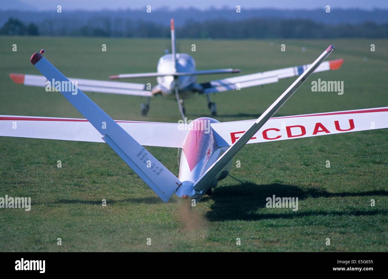 Old glider French plane Siren C-30s Edelweiss taking off towed by a Morane Saulnier MS 893, France Stock Photo