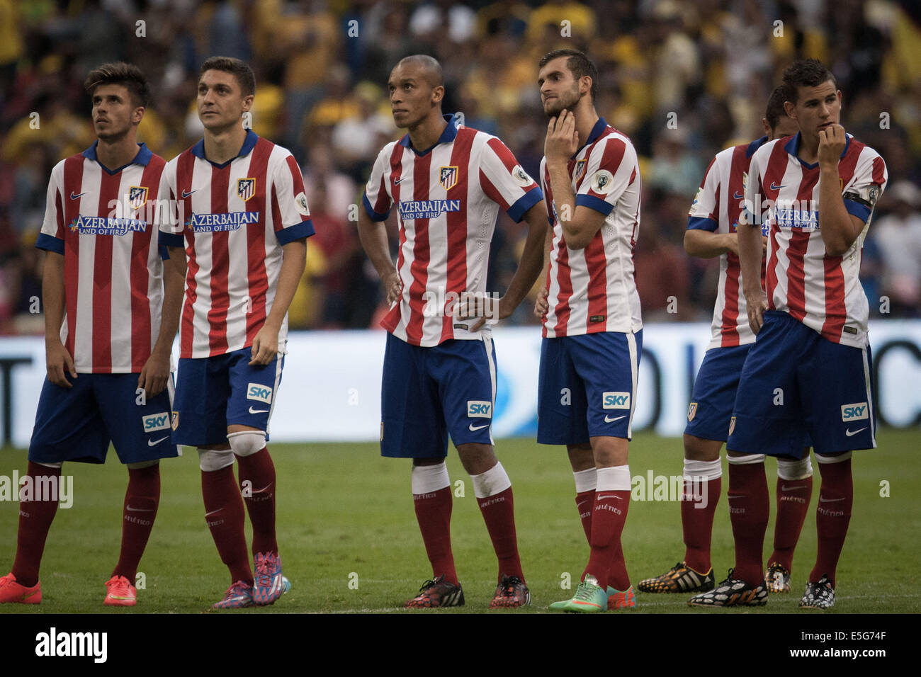 Mexico City, Mexico. 30th July, 2014. Players of Atletico de Madrid react after the match of the EuroAmerican Cup against America held at Azteca Stadium in Mexico City, capital of Mexico, on July 30, 2014. © Pedro Mera/Xinhua/Alamy Live News Stock Photo