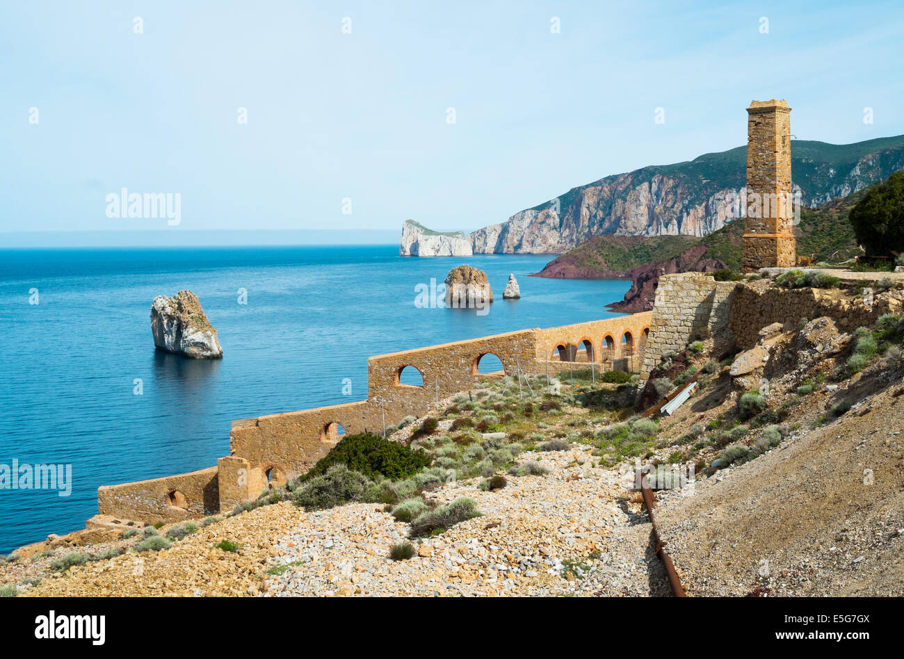 Laveria Lamarmora, an old mine building along the coast of Nebida and Masua, west coast of Sardinia, Italy Stock Photo