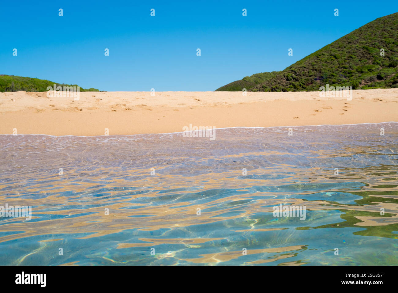 Sea and beach along green coast, west Sardinia, Italy Stock Photo