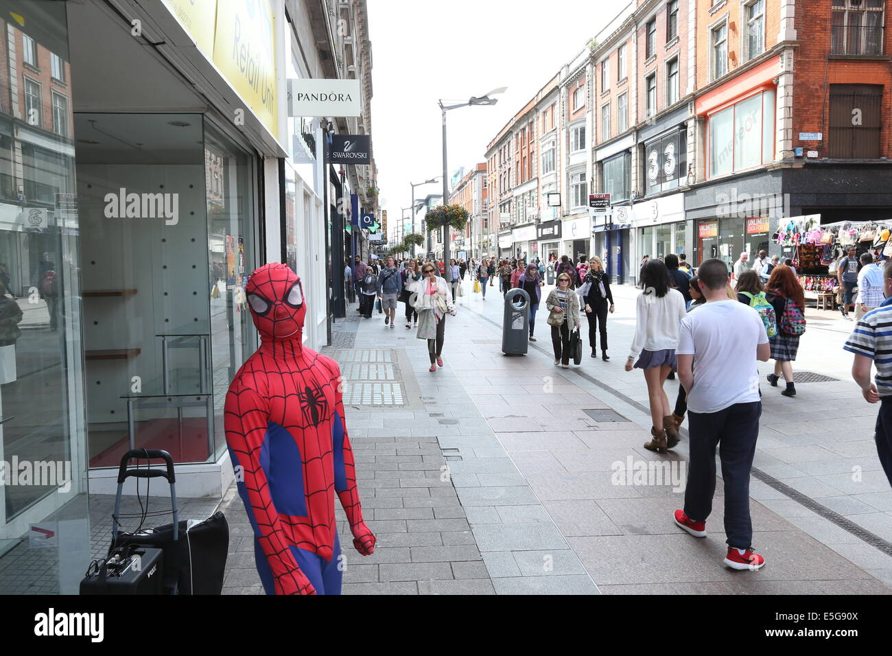 A man dressed as Spiderman stands on Henry Street in Dublin city centre  Stock Photo - Alamy