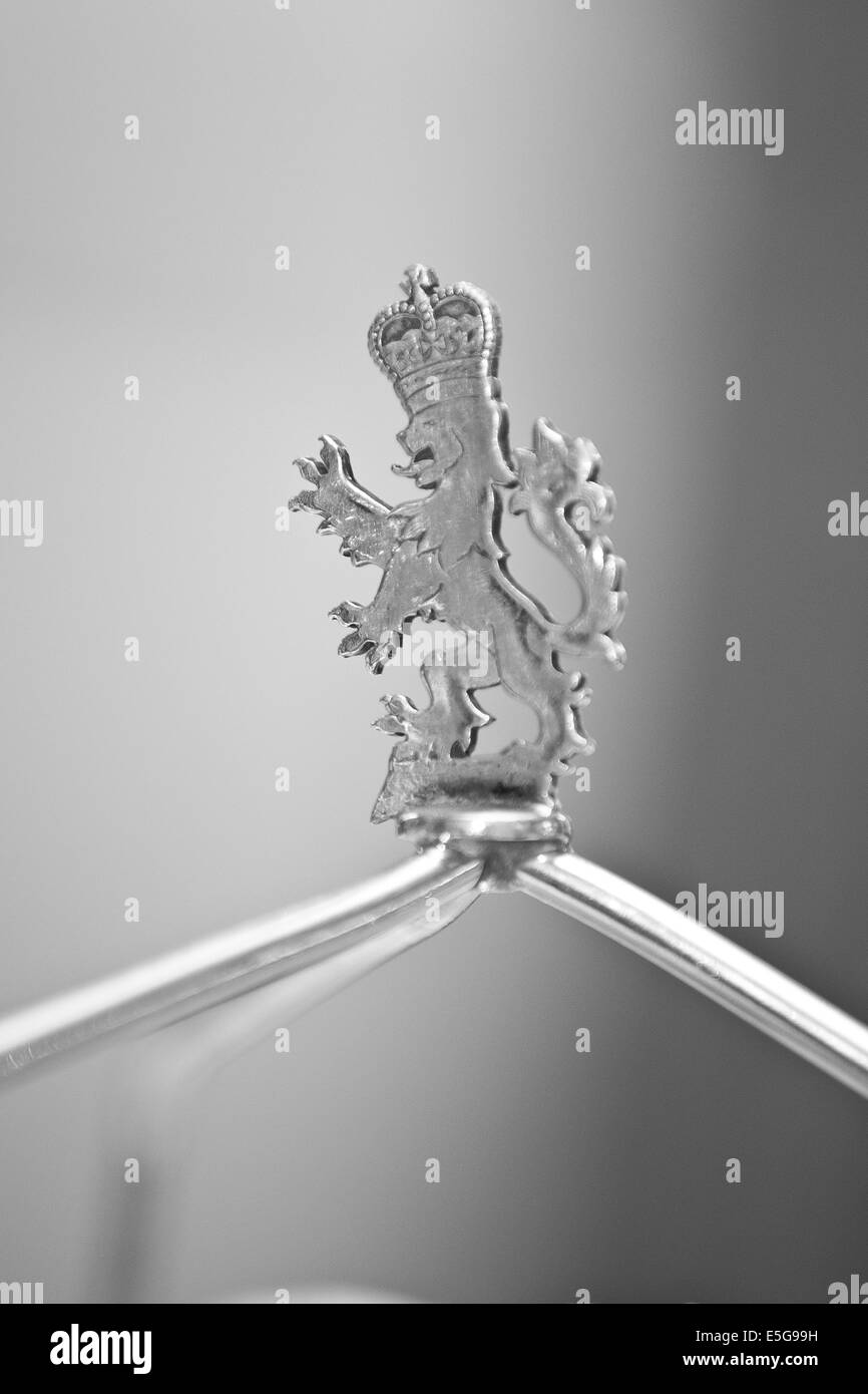 Lion wearing a crown on a cake stand at the Windsor Hotel, Melbourne Stock Photo