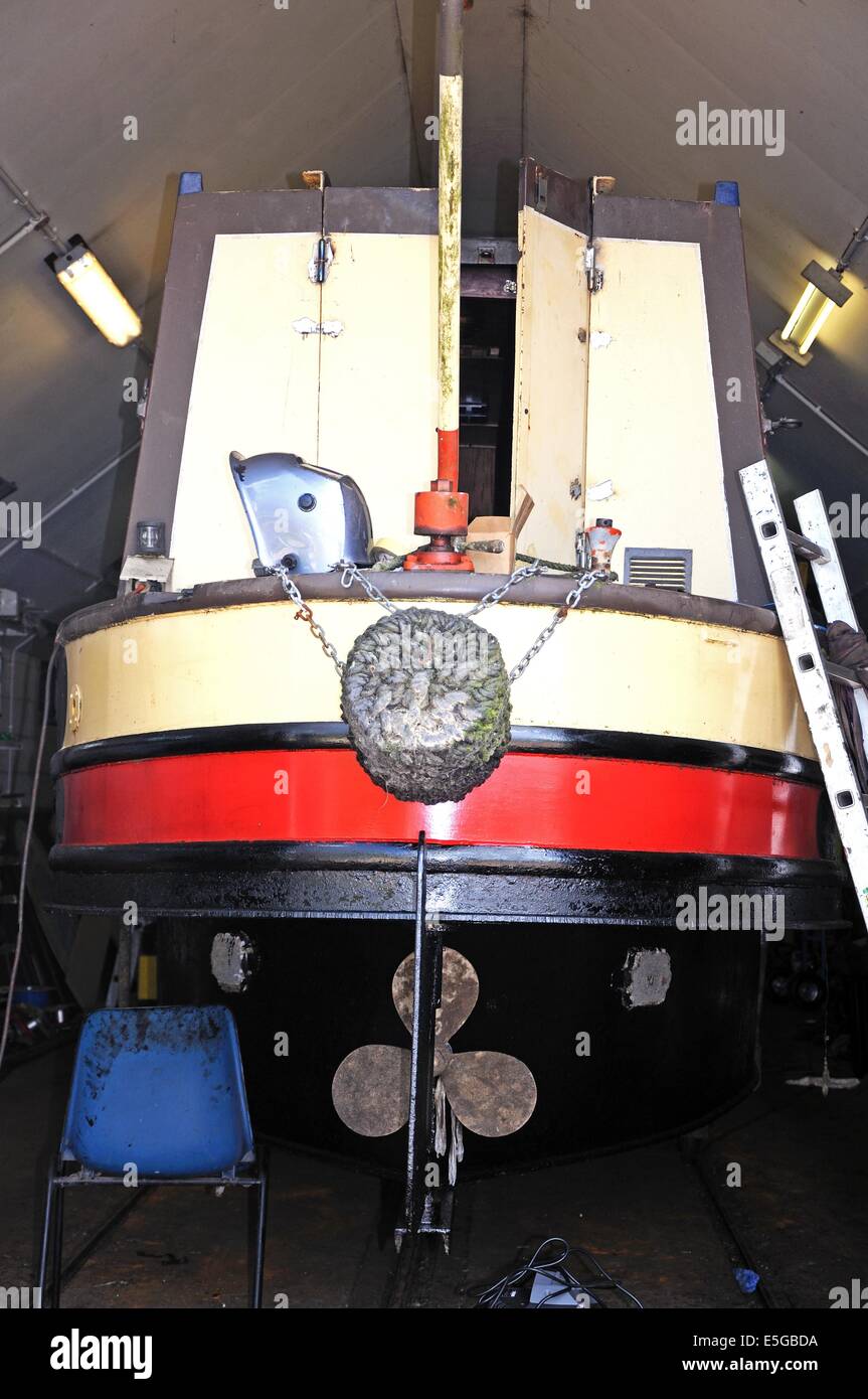 Narrowboat in dry dock in Barton Marina, BartonunderNeedwood