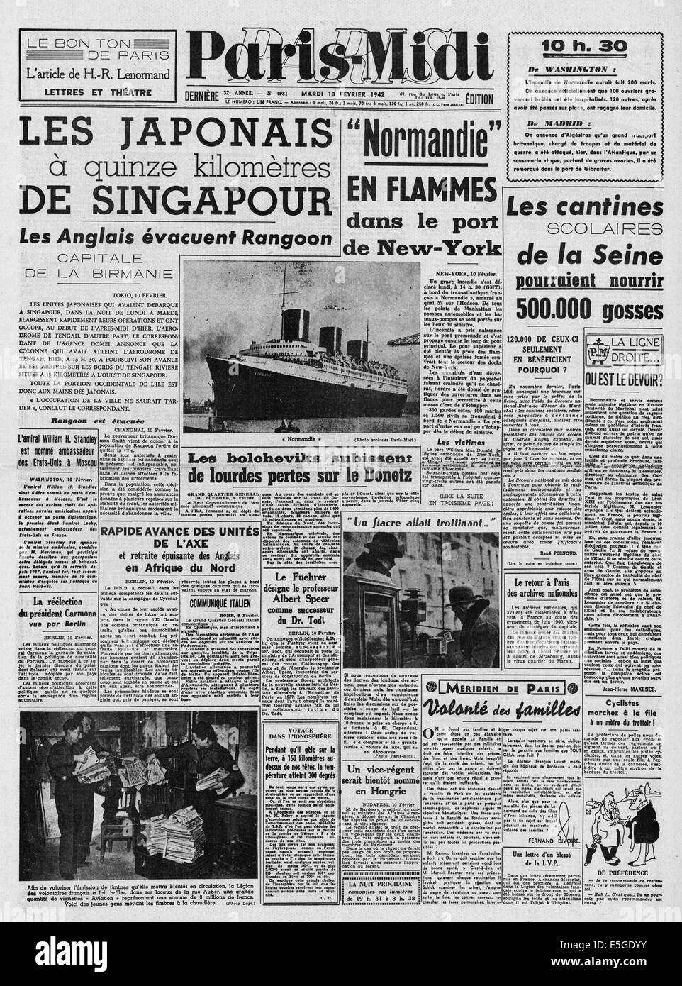1942 Paris-Midi front page reporting Japanese 15 kilometers from Singapore and French passenger liner Normandie catches fire in New York harbour Stock Photo