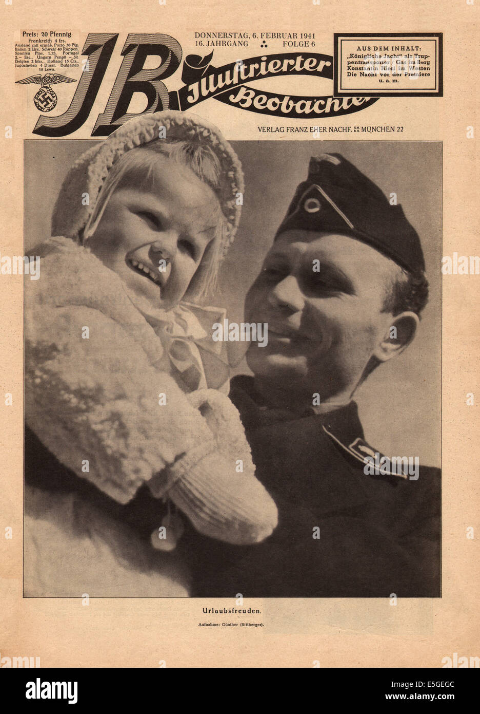 1941 Illustrierter Beobachter front page showing a German tank soldier with his daughter 'Joy on leave' Stock Photo