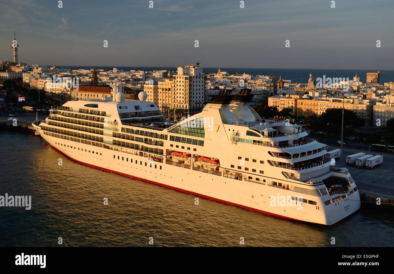 Luxury cruise ship MS Seabourn Sojourn berthed in Cadiz harbour in early morning sunshine. Stock Photo