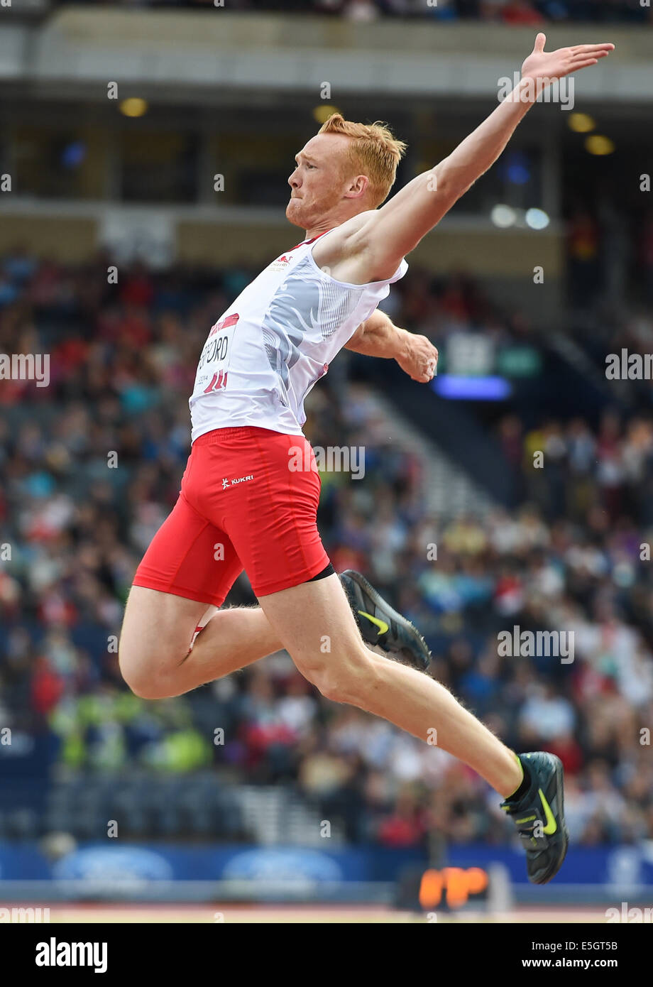 Glasgow, Scotland, UK. 30th July, 2014. Greg Rutherford of England during the mens long jump final on day 7 of the 20th Commonwealth Games at Hampden Park Athletics stadium on July 30, 2014 in Glasgow, Scotland. Credit:  Roger Sedres/Alamy Live News Stock Photo