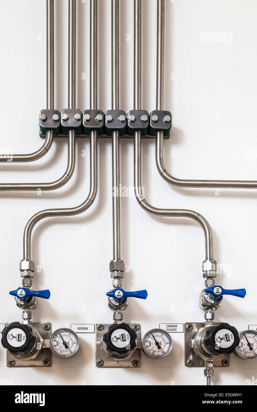Pipes supplying a scientific research laboratory with the main gases found in our atmosphere. Stock Photo