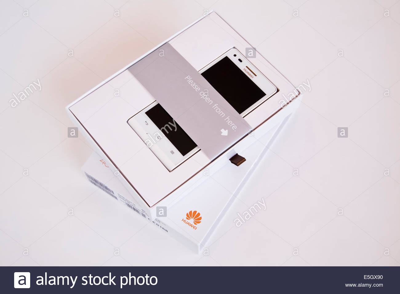 Huawei Ascend G6 mobile phone and accessories with packaging Stock Photo -  Alamy