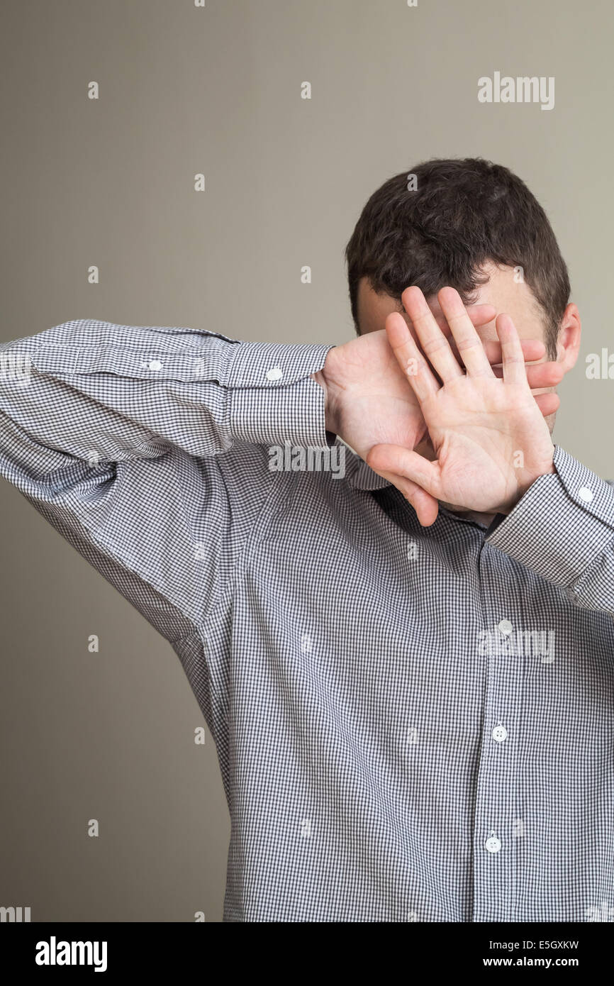 Hiding face hand portrait hires stock photography and images Alamy
