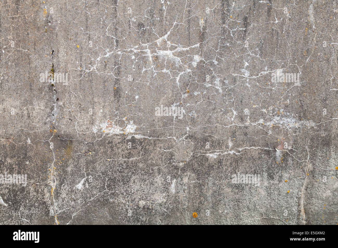 Old concrete wall with cracks, background texture Stock Photo
