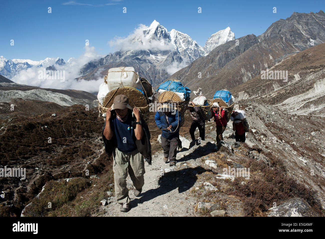 Sherpa's working in the Everest region in Nepal. Sherpa people are an  ethnic group in eastern area of the country Stock Photo - Alamy