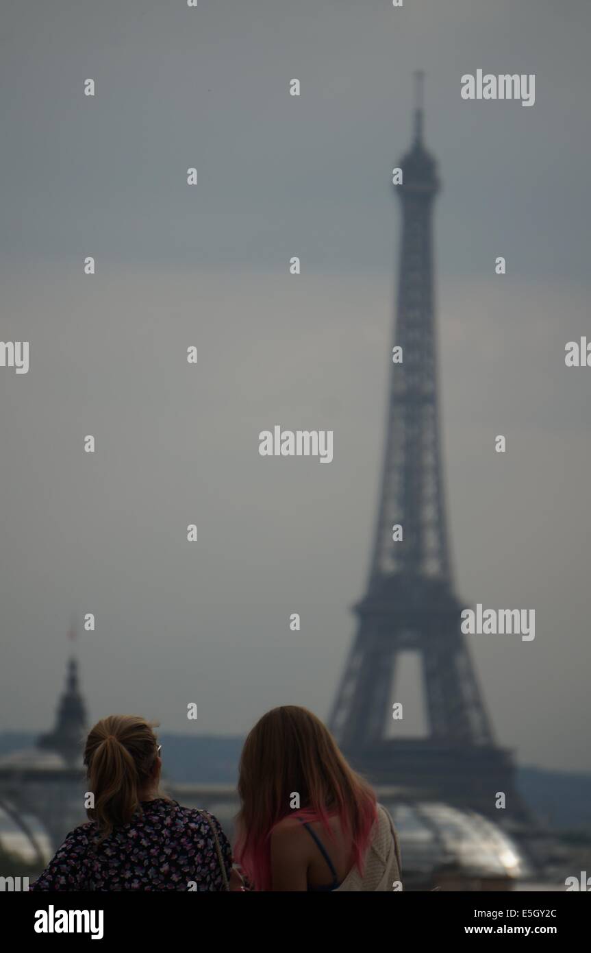 Two women looking at the eiffel tower hi-res stock photography and images -  Alamy