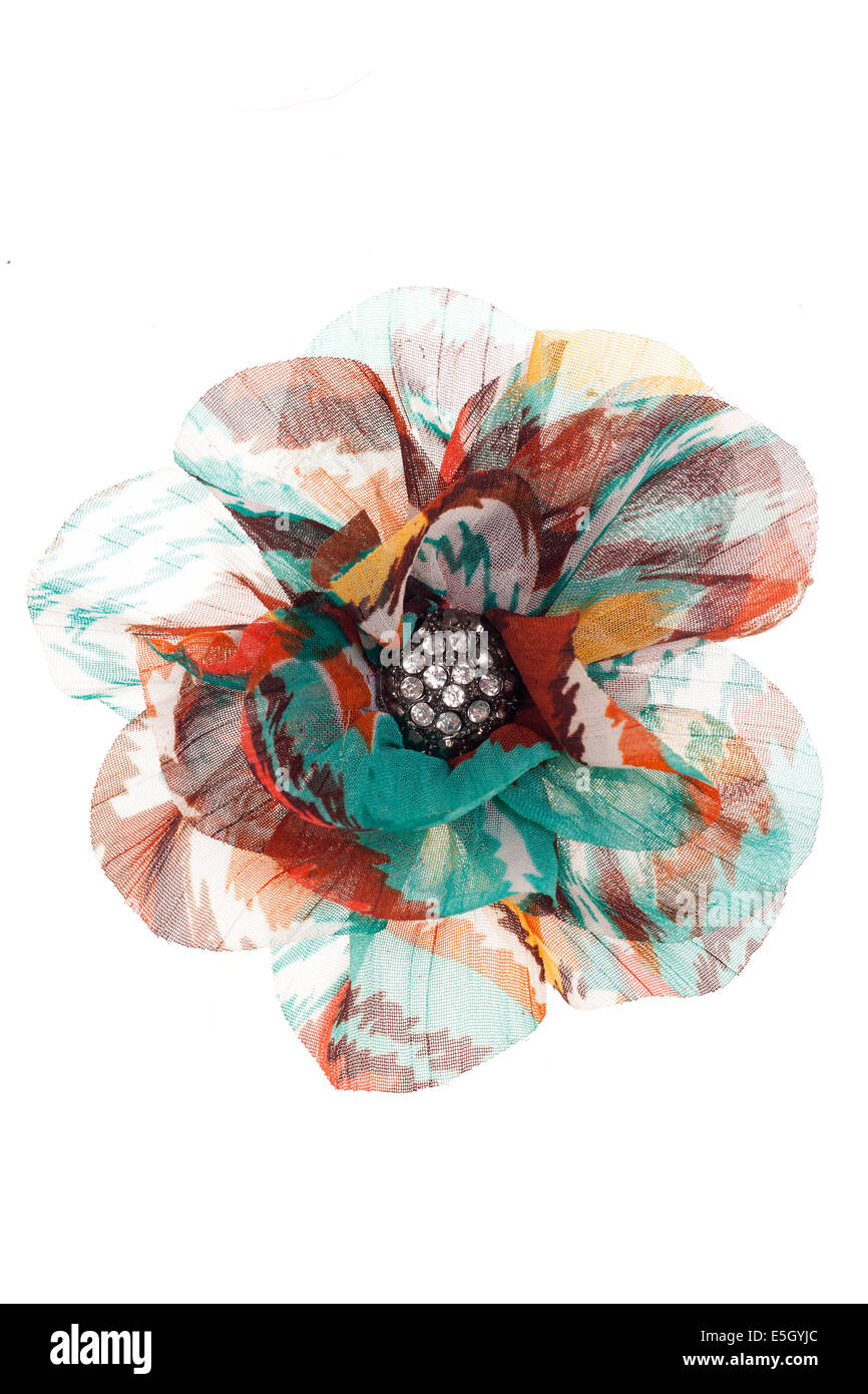 multi coloured flower brooch studio cutout Stock Photo