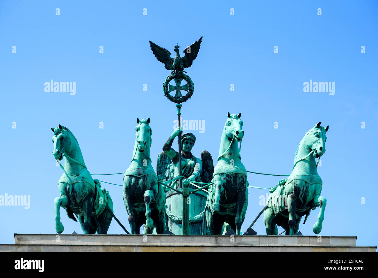 Detail of Quadriga statues on top of Brandenburg Gate in Berlin Germany Stock Photo