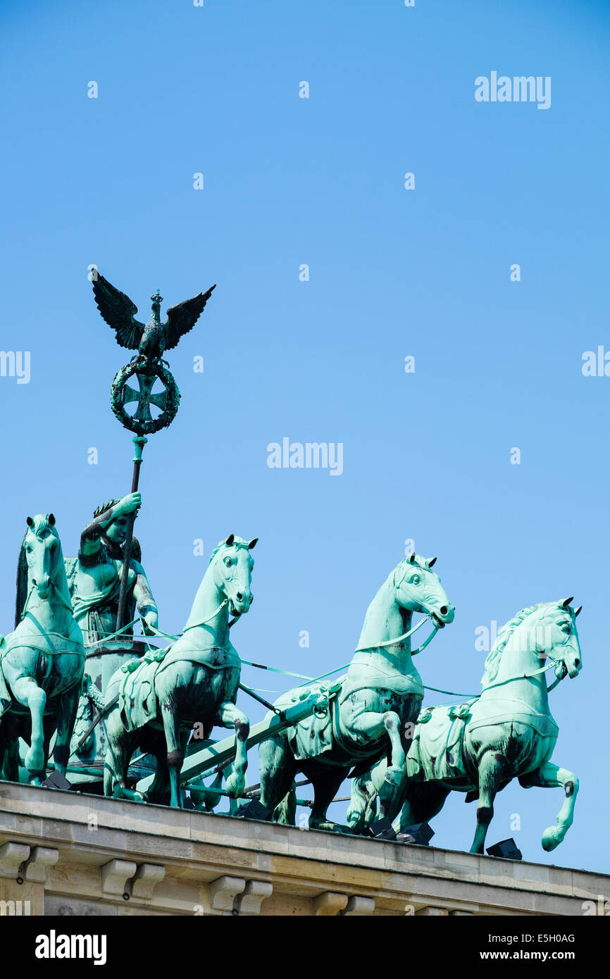Detail of Quadriga statues on top of Brandenburg Gate in Berlin Germany Stock Photo