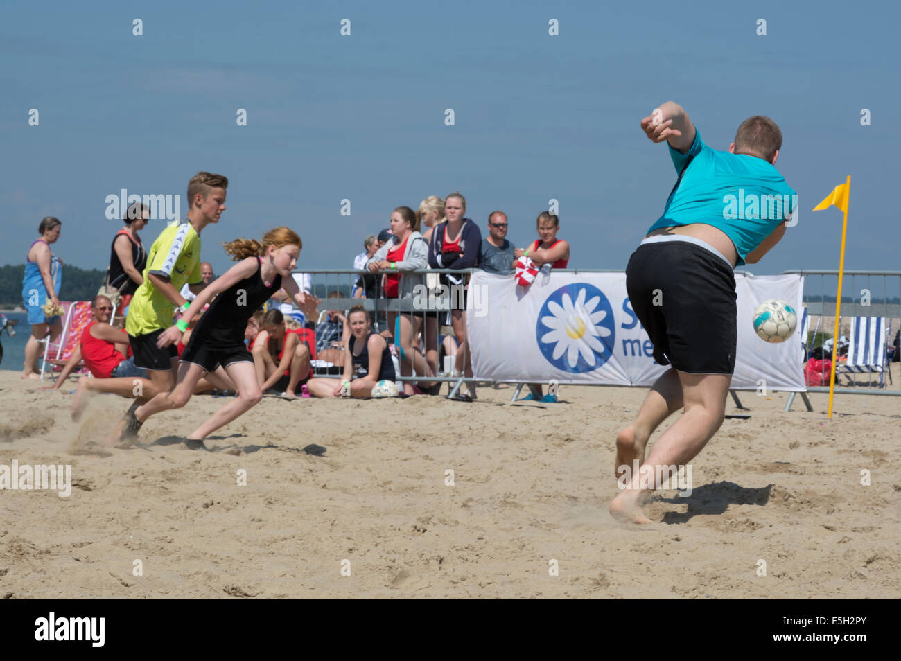 Goalkeeper makes a run for the ball at Täppet beach, Beach Soccer Ahus
