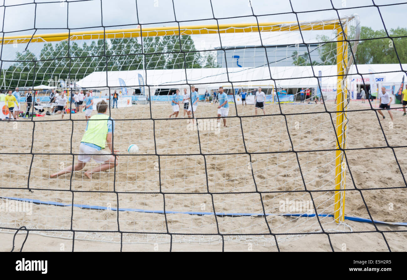 Goalkeeper saves the ball at Täppet beach, Beach Soccer Ahus Tournament