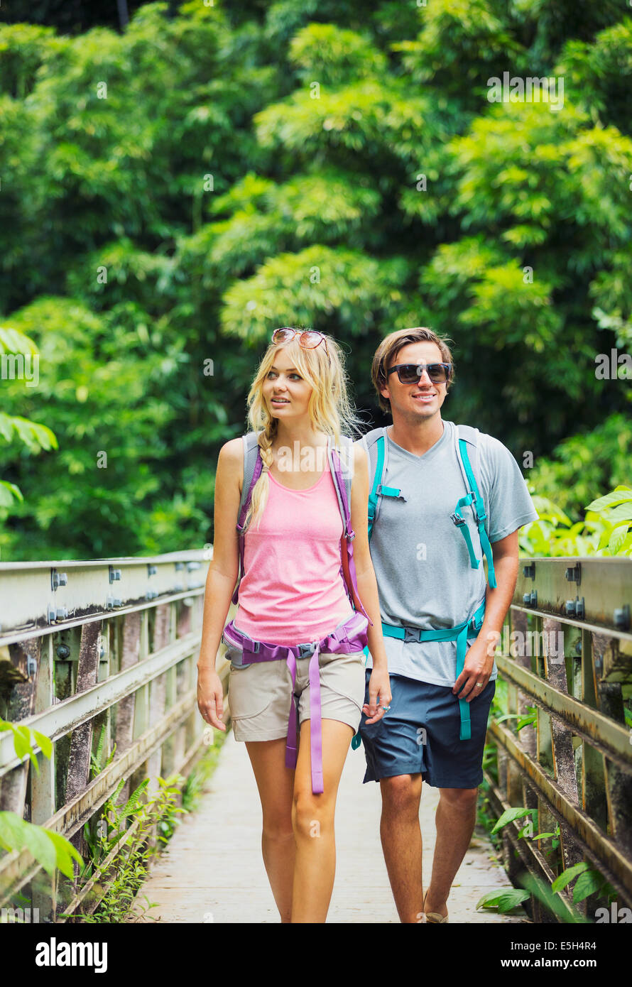 Attractive young couple having fun together outdoors on hike Stock Photo