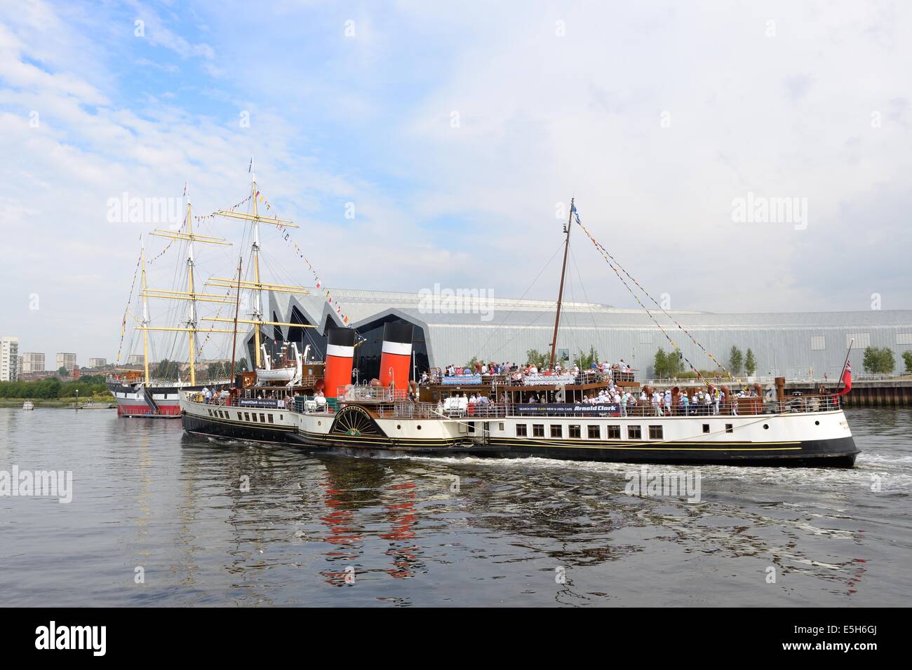 The PS Waverley on the river Clyde passing the Glenlee sailing ship and