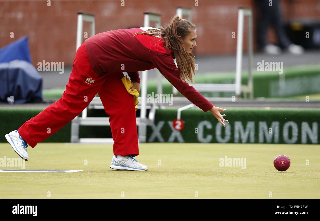 Glasgow, Scotland. 31st July, 2014. Sophie Tolchard of England bowls during the women's triples gold medal match of Lawn Bowls between England and Australia on day 8 of the Glasgow 2014 Commonwealth Games at Kelvingrove Lawn Bowls Centre in Glasgow, Scotland, on July 31, 2014. England claimed the title with 22-4. Credit:  Wang Lili/Xinhua/Alamy Live News Stock Photo