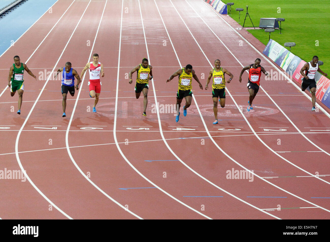 Hampden Park, Glasgow, Scotland, UK, Thursday, 31st July, 2014. Rasheed Dwyer, gold, Warren Weir, silver, Jason Livermore, bronze, for Jamaica in the Men's 200m Final at the Glasgow 2014 Commonwealth Games Stock Photo