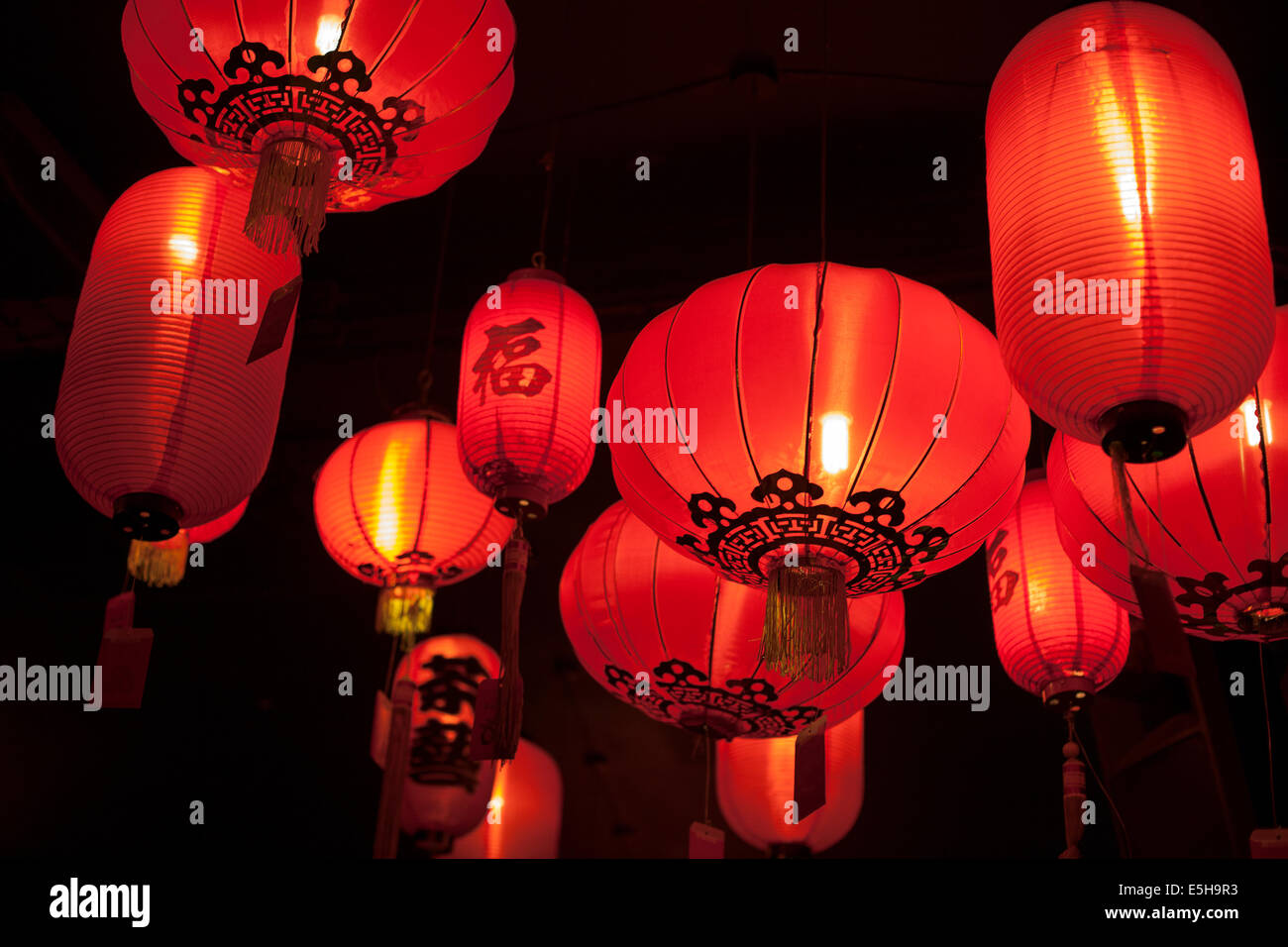 Bright red Chinese lanterns lit up Stock Photo - Alamy