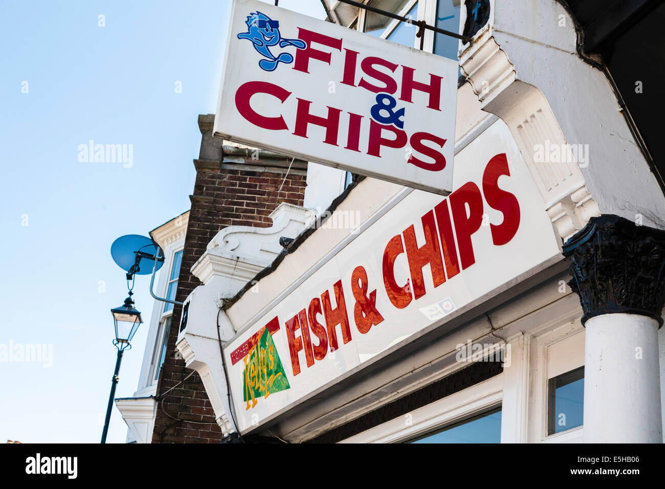 Fish & Chips sign above chip shop. Stock Photo