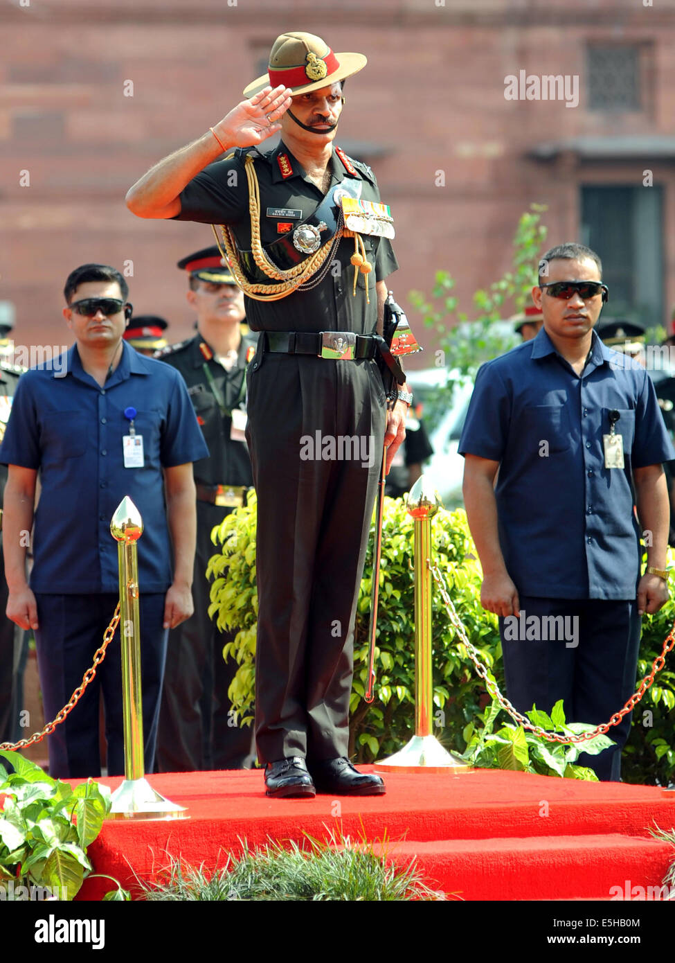 New Delhi. 1st Aug, 2014. General Dalbir Singh Suhag (L) takes the salute at a ceremony as he becomes the new Indian Army Chief at the lawn of Indian Defence Ministry at South Block in New Delhi on Aug. 1, 2014. © Partha Sarkar/Xinhua/Alamy Live News Stock Photo