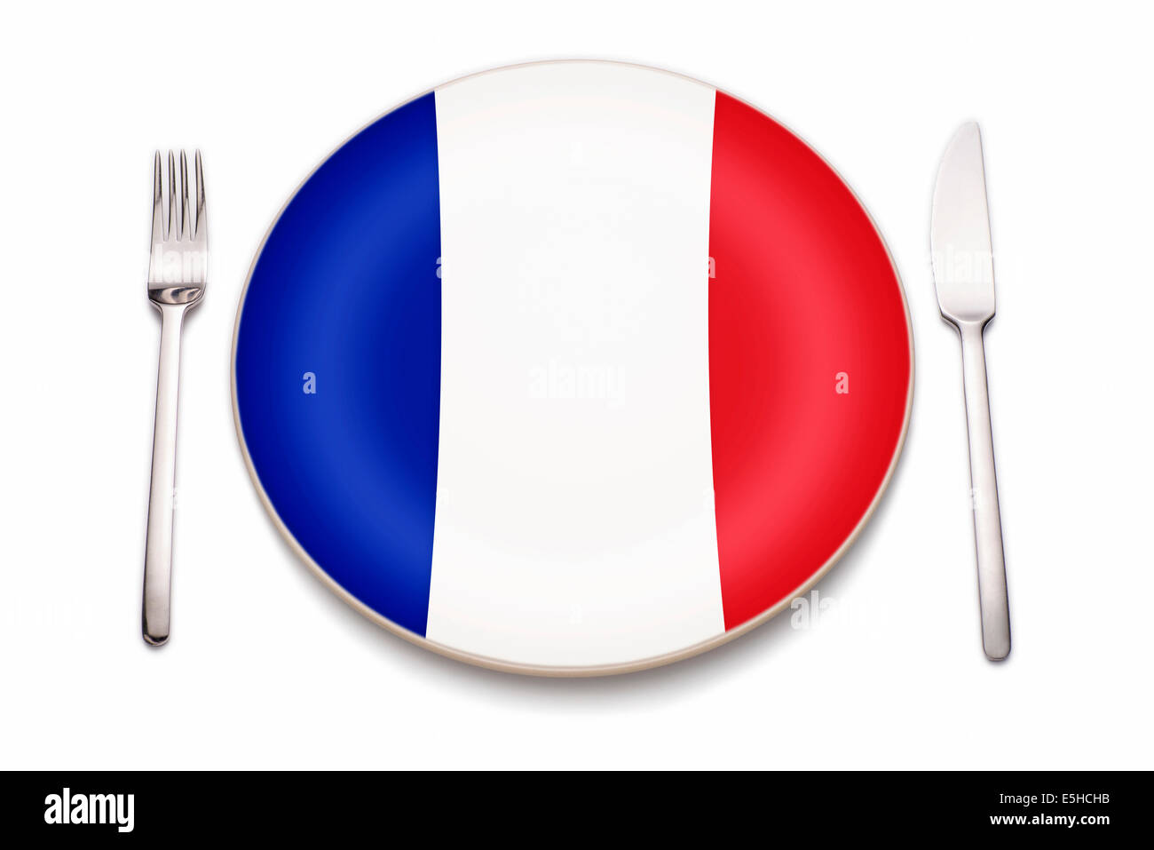 Knife, fork and a plate in the colors of the French flag. Digital