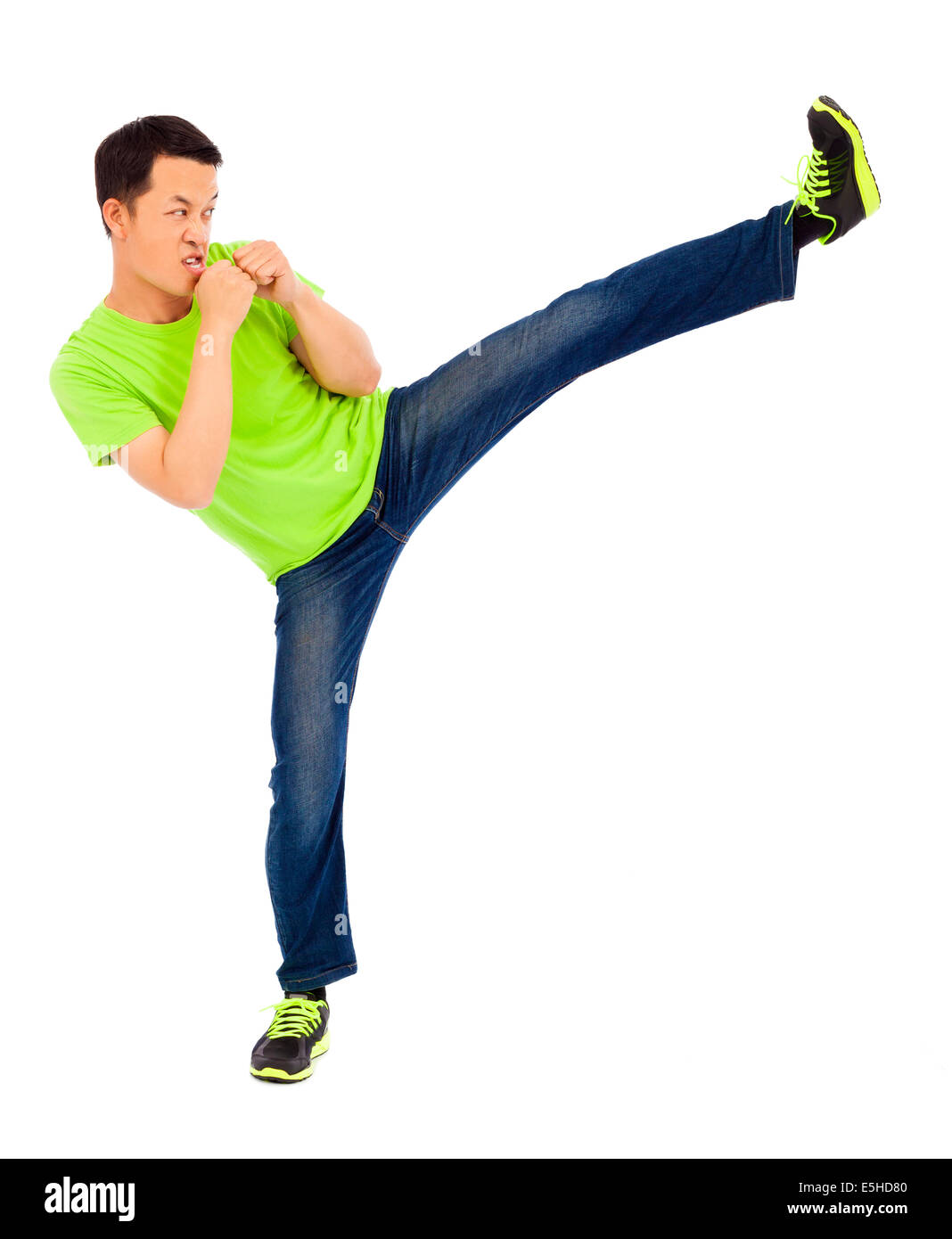 young man raise leg to kick. martial art concept Stock Photo Alamy