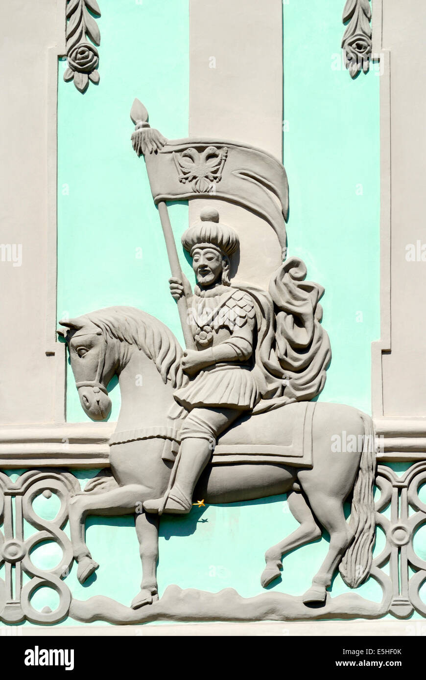 Pardubice, East Bohemia, Czech Republic. House Facade on Perstynovo namesti (main square) Man in uniform on horseback Stock Photo