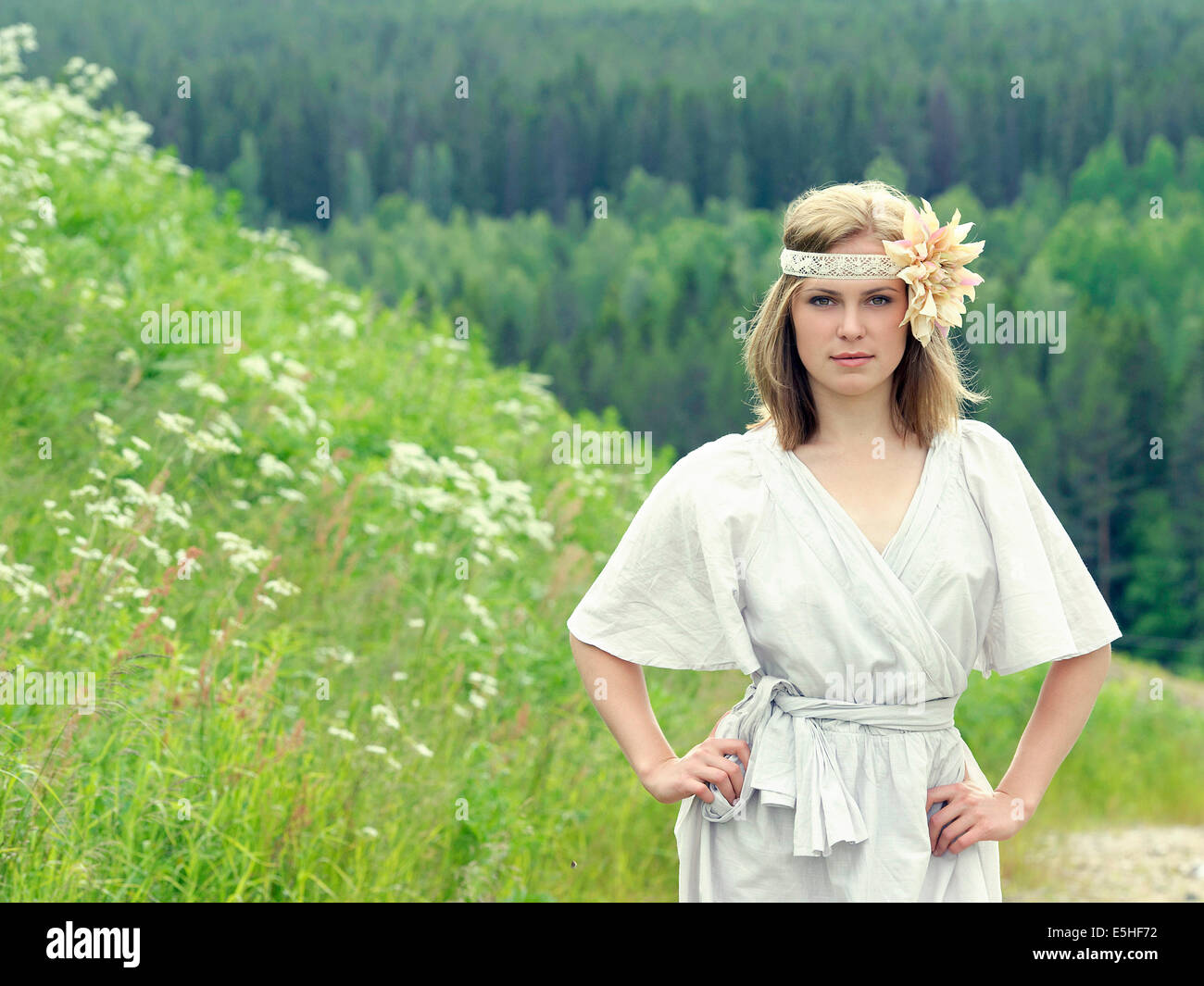 Portrait of a beatiful young woman in the meadow Stock Photo - Alamy