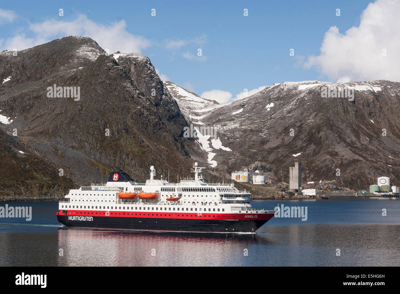 Norway, Finnmark, Honningsvåg, Hurtigruten Nordlys enters port Stock Photo