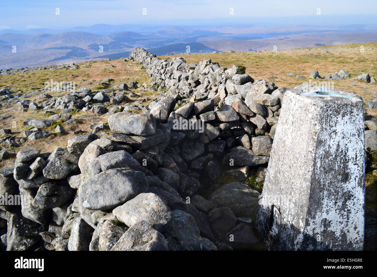 Dry Stone Wall & Shelter with Triangulation Point on the Summit of Cairnsmore of Carsphairn (A Corbett) Stock Photo