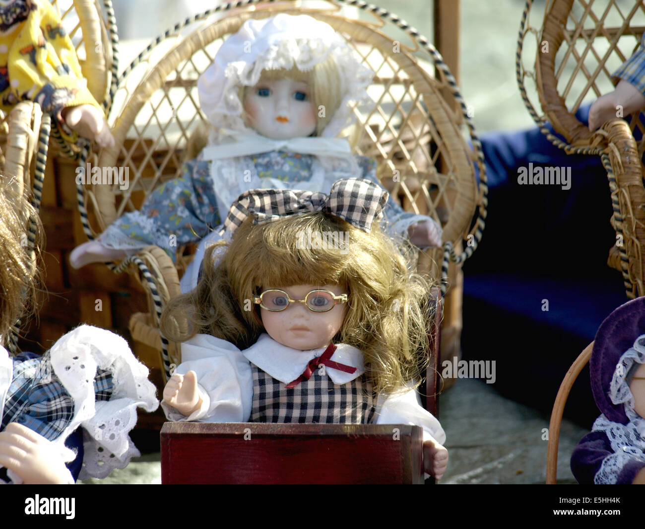 Old dolls for sale at antiques fair Stock Photo Alamy