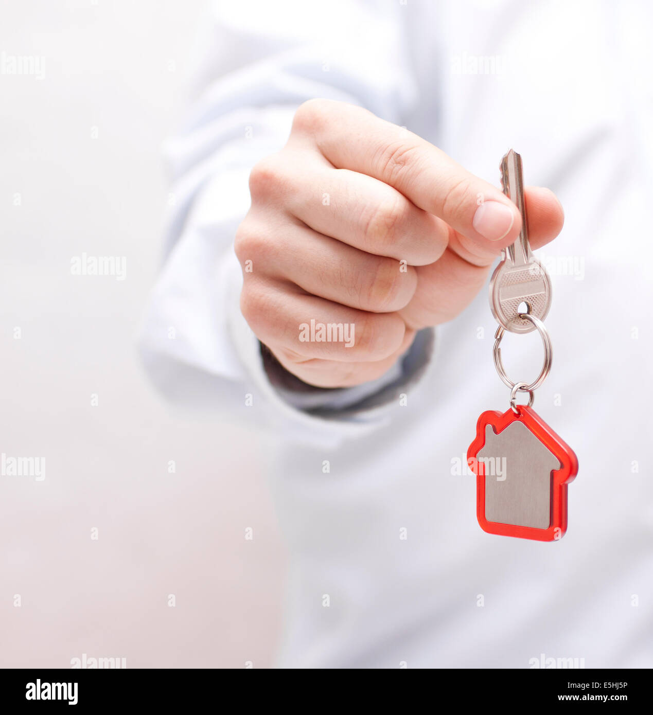 House key in hand Stock Photo