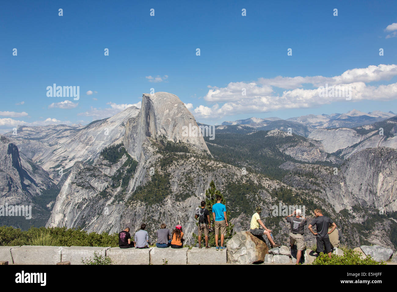 Visitors in front of the Half Dome, Yosemite National Park, California, United States Stock Photo